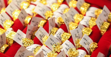 Giá vàng thế giới rơi thẳng đứng, có lúc thủng mốc 5.000 USD/ounce