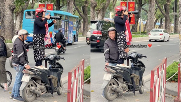 Clip cụ ông dựng xe máy giúp vợ chụp ảnh 'với cả bầu trời cưng chiều' gây sốt