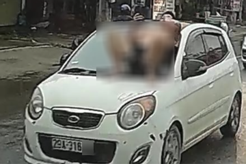 Nam thanh niên nằm trên nắp capo ô tô đang chạy ở Hà Nội: Khởi tố bố và con rể