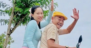 NSND Việt Anh đưa vợ trẻ kém 36 tuổi dạo phố