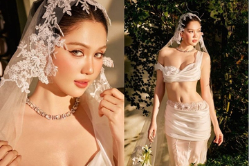 Ngọc Trinh khoe dáng với váy cưới cắt xẻ táo bạo không cô dâu nào dám mặc