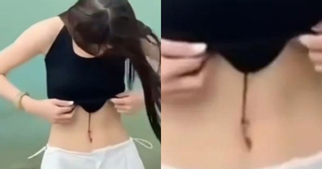Khoe eo thon bên hồ, cô gái 