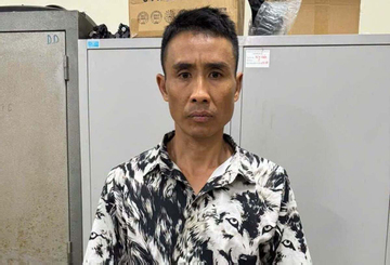 Tạm giữ hình sự người đàn ông xăm trổ đánh nam thanh niên trên phố Hà Nội